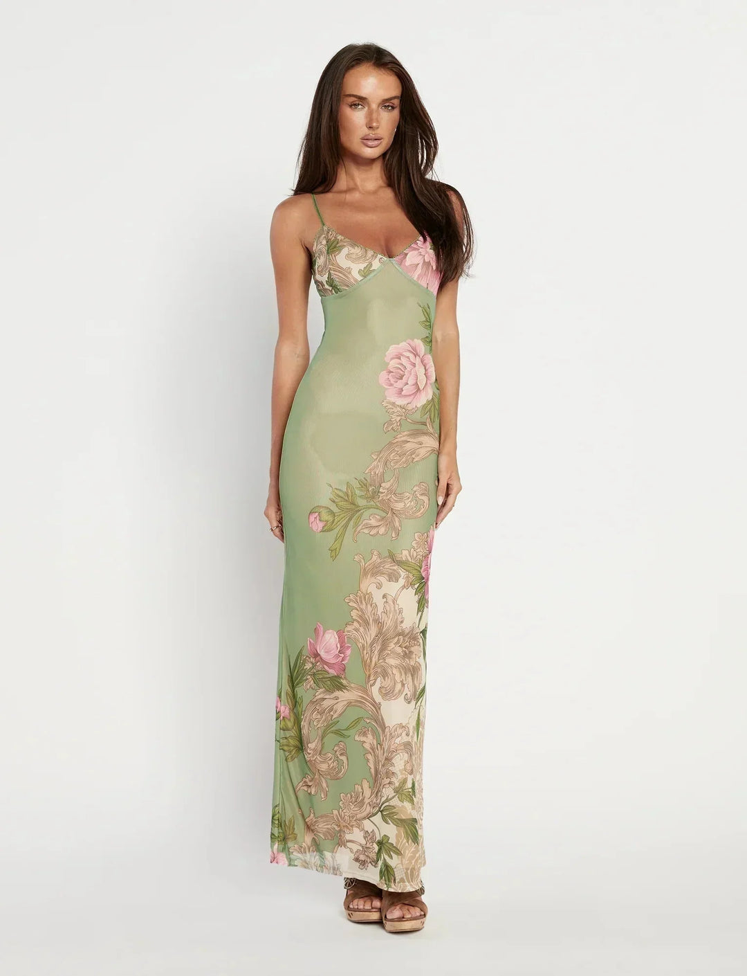 Form-fitting floral maxi dress with a delicate floral pattern and a sleek silhouette by Valery, perfect for a summer garden…