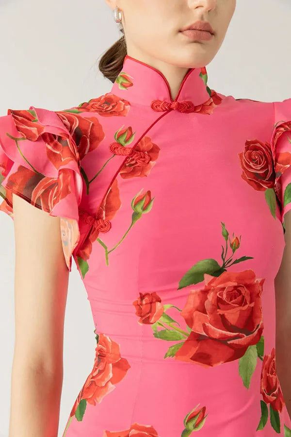 Pink floral maxi dress with high neckline, ruffled sleeves. Features a beautiful floral print on soft chiffon fabric.