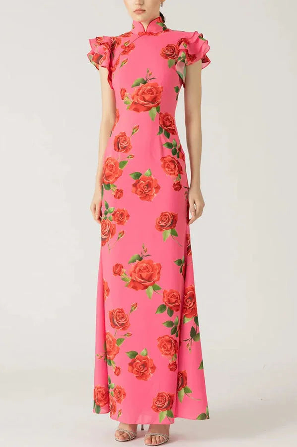 Pink floral maxi dress with high neckline and ruffled sleeves, perfect for a boho-chic look.