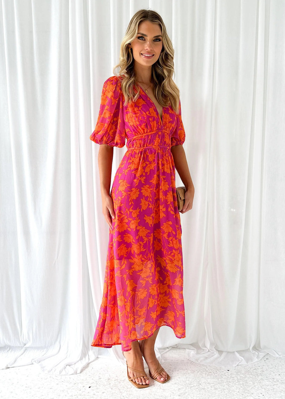 Bright pink floral maxi dress with a whimsical willow pattern, perfect for summer events. Made from lightweight, breathable…