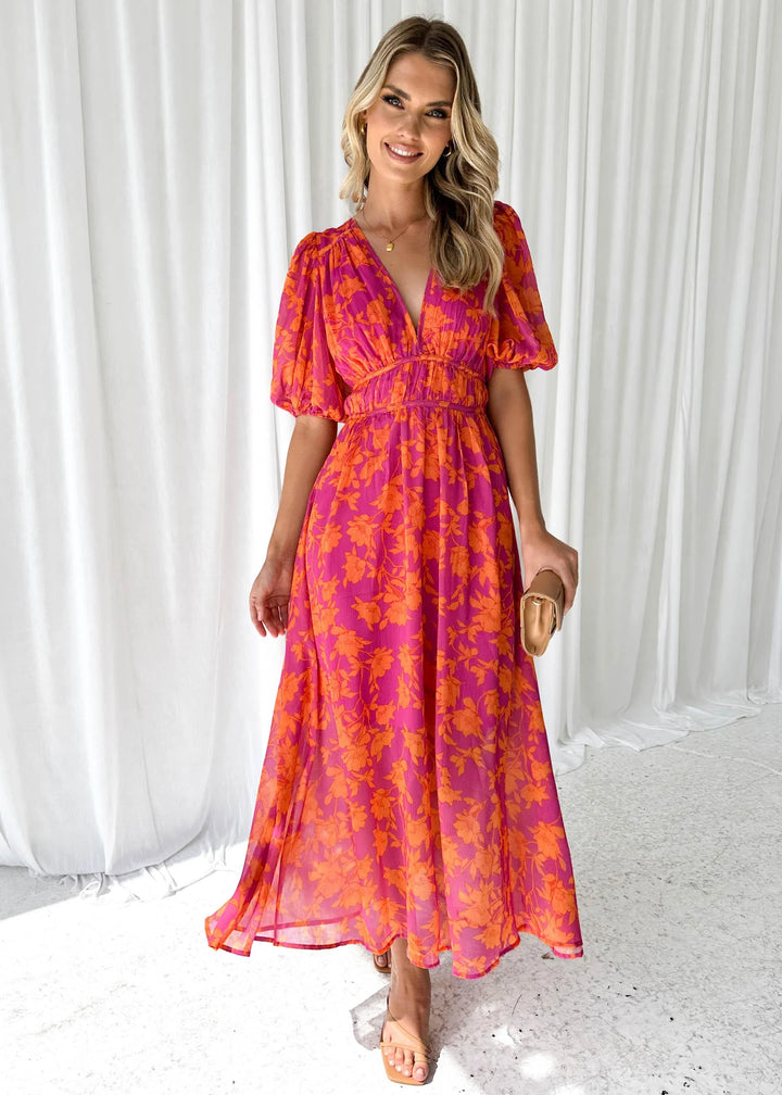 Bright pink floral maxi dress with a gorgeous willow pattern design, made of lightweight breathable fabric.