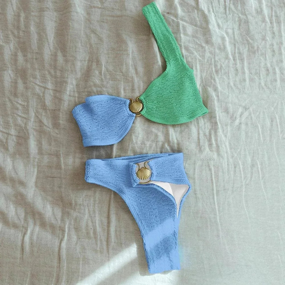 Women's asymmetrical bikini in textured finish, featuring a unique design.