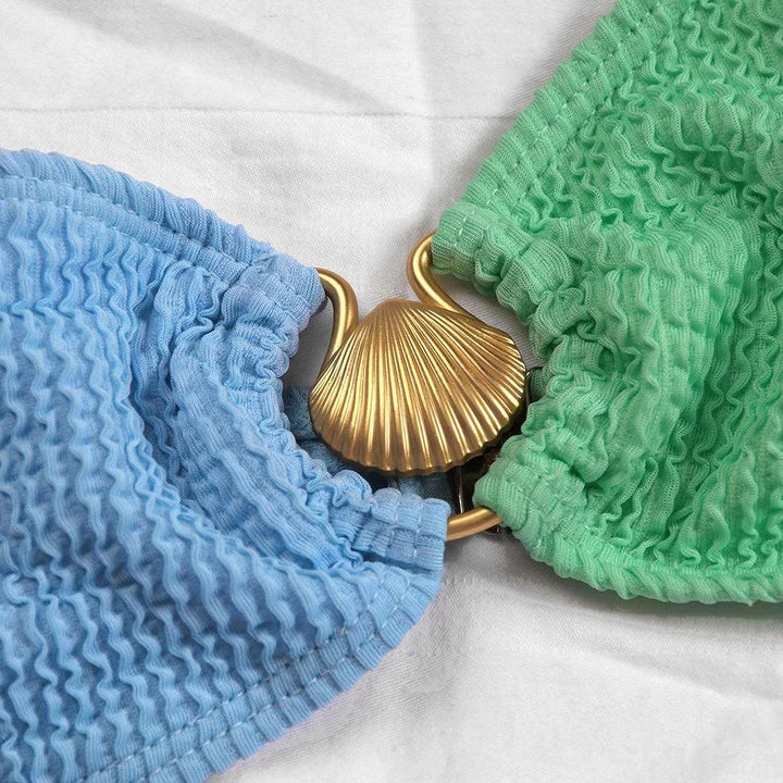 Asymmetrical bikini for women in textured finish, stylish design with unique silhouette, perfect for pool or beach.