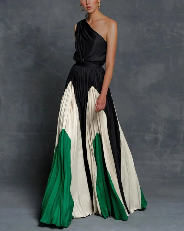 Green one-shoulder pleated maxi dress made with a flowing and elegant design for a sophisticated look.