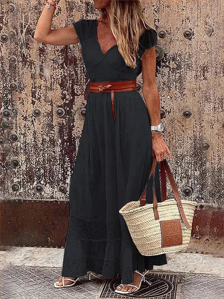 "Xavia - V-neck belted lace maxi dress in black, featuring delicate lace design, cinched waist with belt, and elegant…