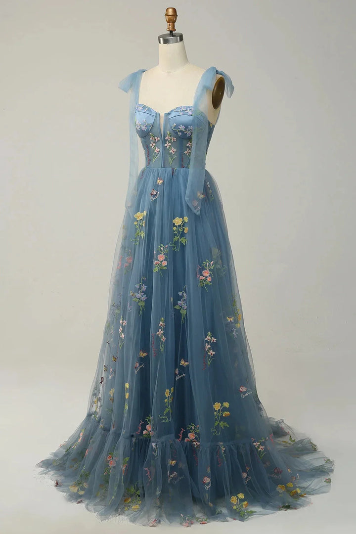 "Yanely dress: Elegant embroidered tulle with sheer overlay, perfect for special occasions. Feminine and sophisticated…