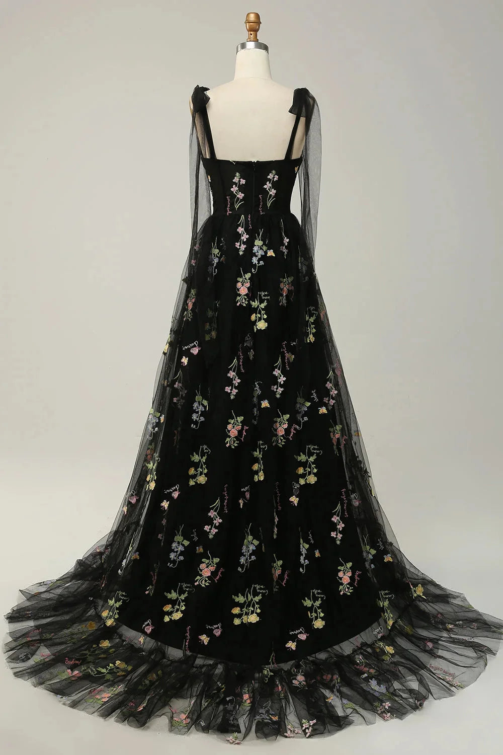 "Yanely dress: Sheer overlay embroidered tulle design in soft colors, perfect for special occasions or elegant gatherings."