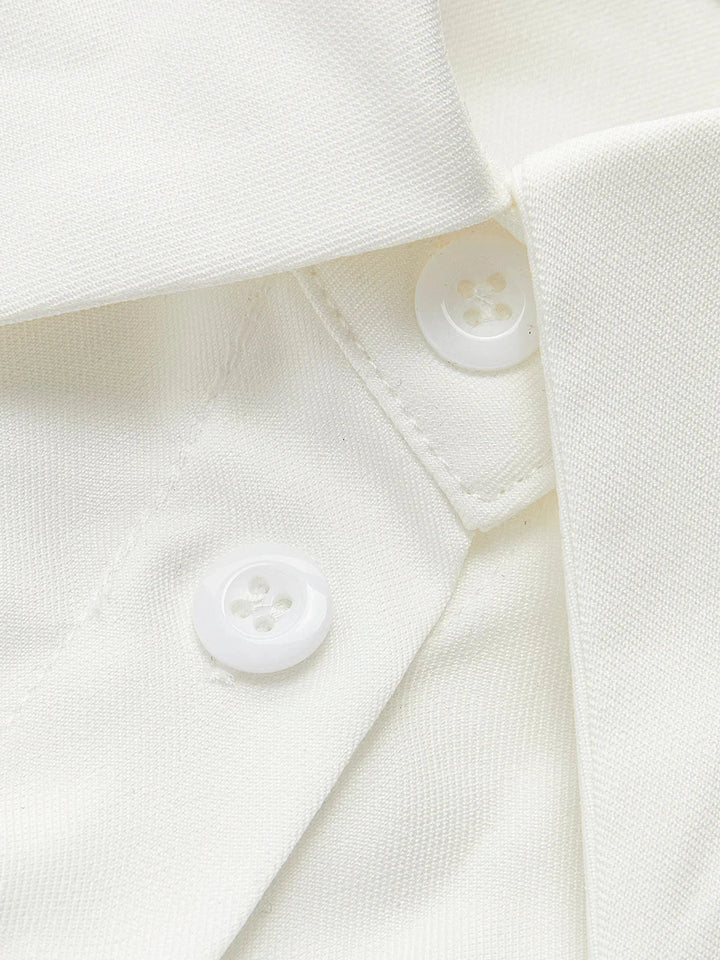 Two-tone tailored blouse with collar, featuring a chic and modern design.