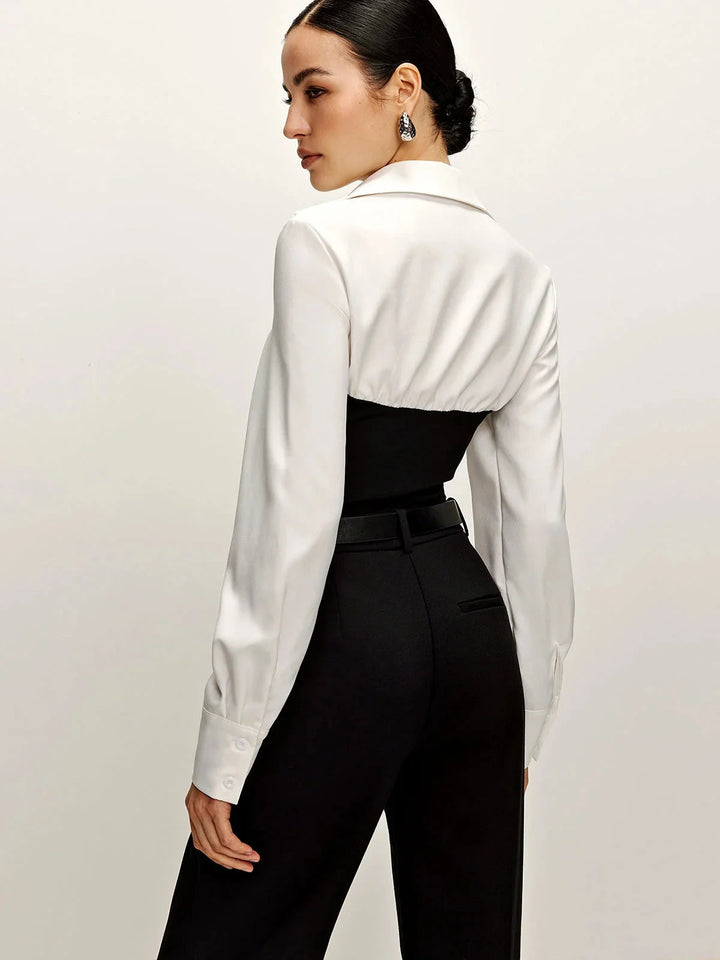 Two-tone tailored blouse with a classic collar in a modern design, perfect for a sophisticated look.