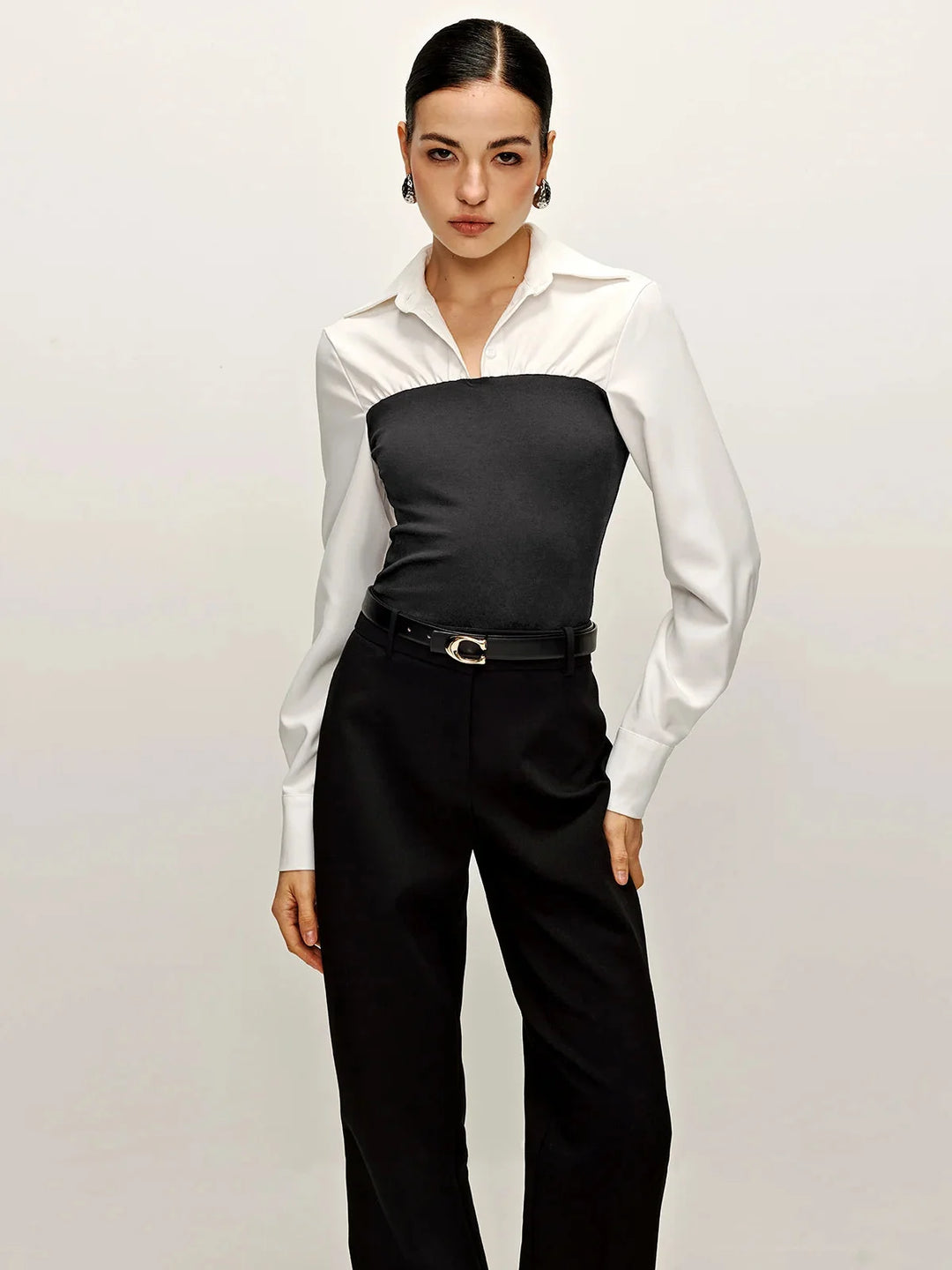Grey Yari tailored blouse with collar in two-tone design, featuring high-quality fabric and a sophisticated style for…
