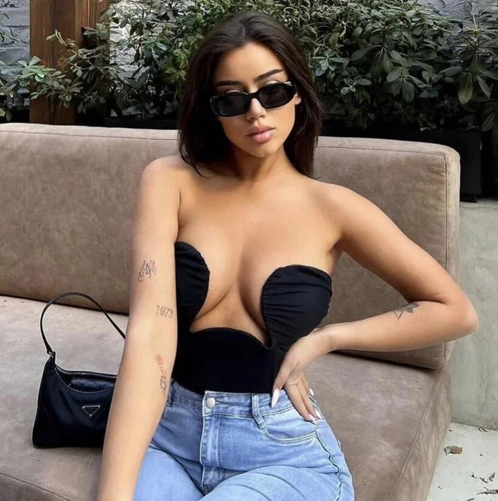 Strapless bustier with wavy trim for women made of soft, supportive fabric in a snug fit.