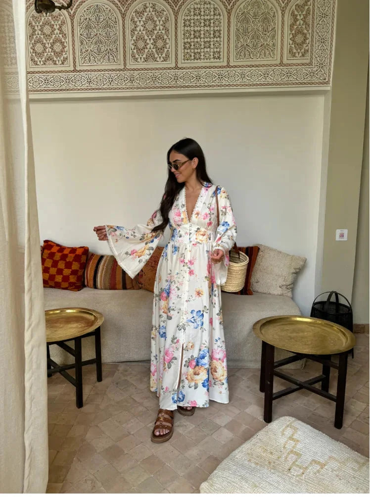 "Yelitza boho dress with long sleeves, showcasing a charming floral pattern design in a lightweight and breathable fabric."