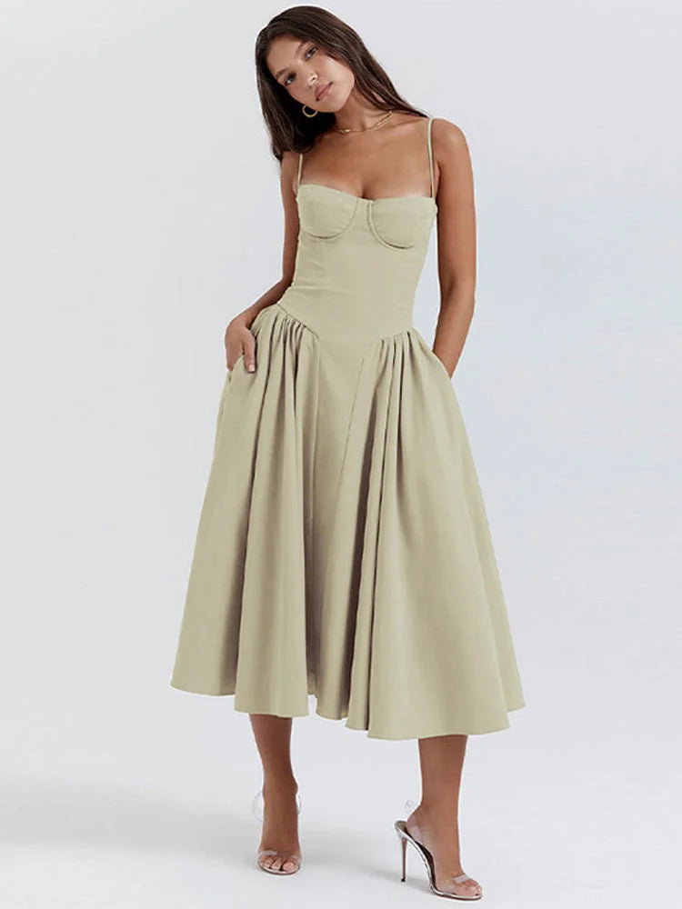 Green slimming bodice sundress with flared skirt by Yides, made of stretchy fabric. Perfect for casual or special occasions.