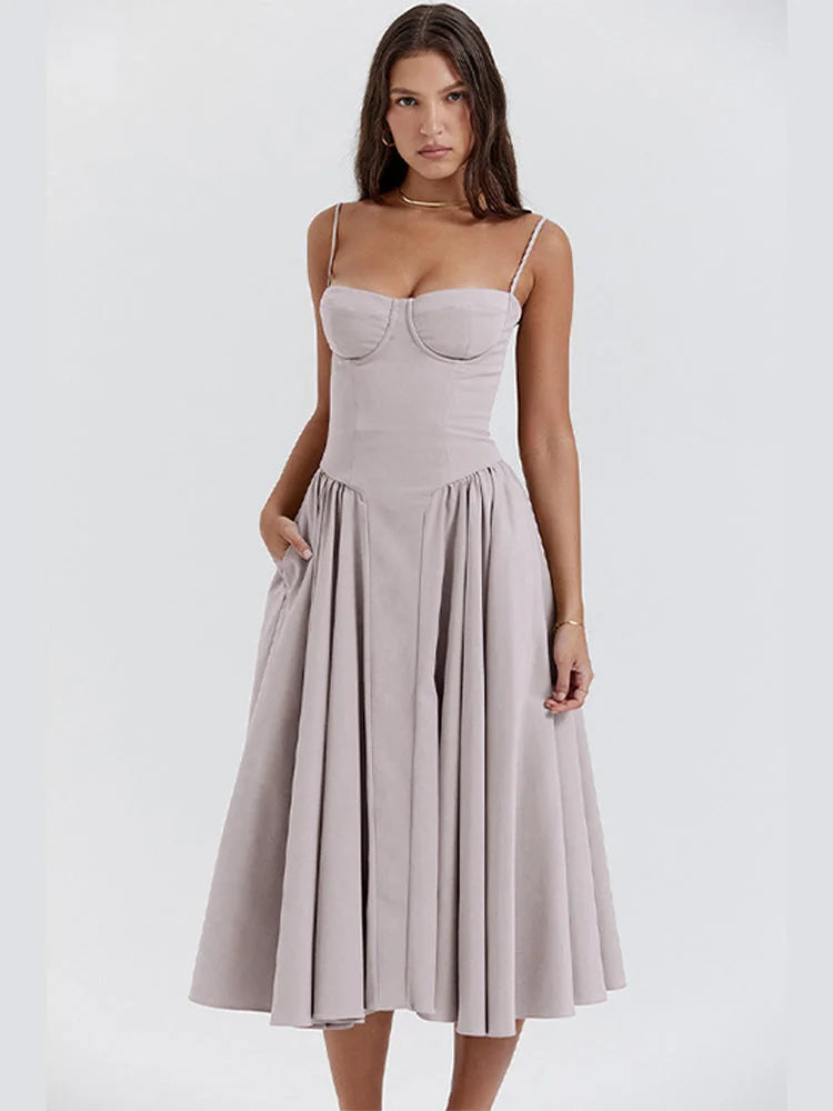Light grey slimming bodice sundress with flared skirt by Yides. Features soft cotton fabric and a flattering silhouette for…