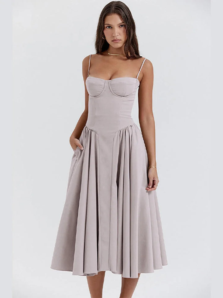 Light grey slimming bodice sundress with flared skirt by Yides. Features soft cotton fabric and a flattering silhouette for…