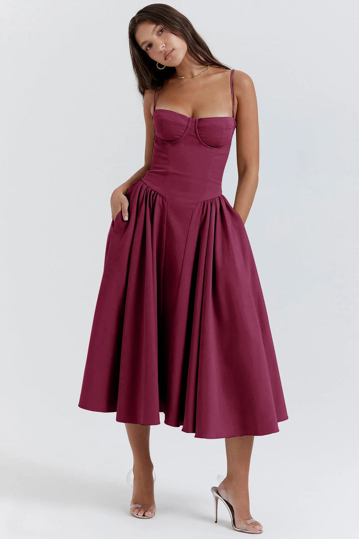 Plum red sundress with flared skirt, ideal for slimming effect. Made from high-quality fabric with a flattering bodice…