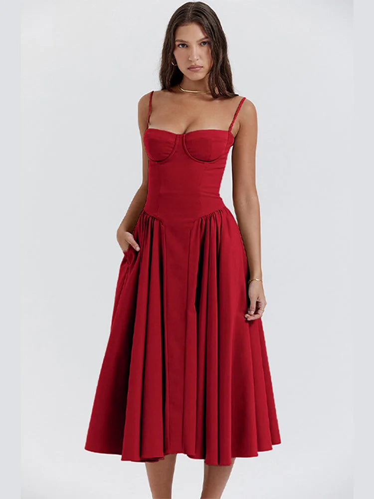 Red sundress with slimming bodice and flared skirt by Yides in breathable cotton blend fabric. Sophisticated and flattering…