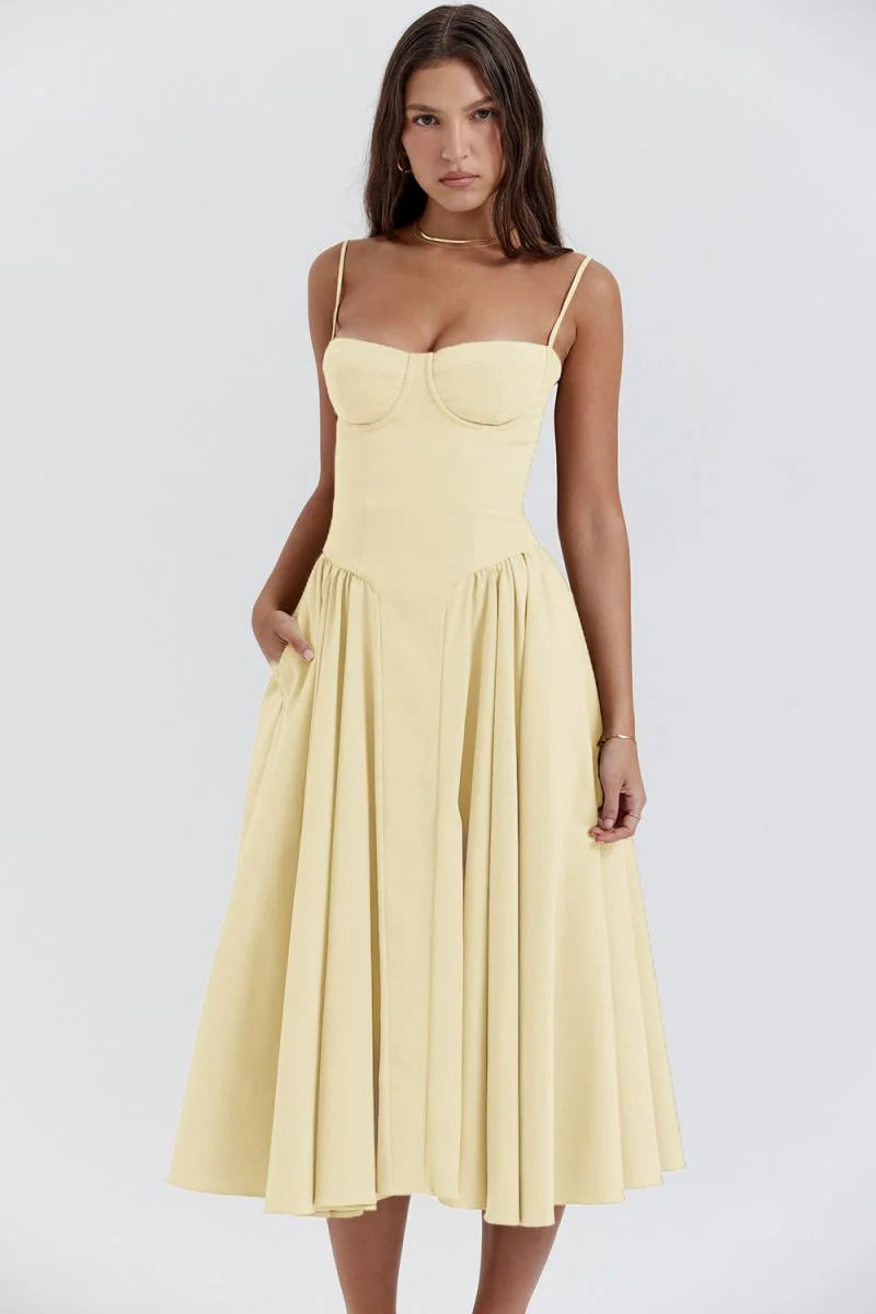 Yellow slimming bodice sundress with flared skirt by Yides. Features button-up front, breathable fabric, and flattering…