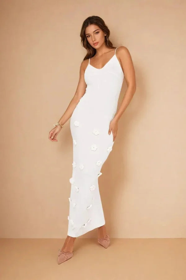 "Zaia maxi dress featuring intricate floral appliqué design, ideal for a casual yet stylish look for women."