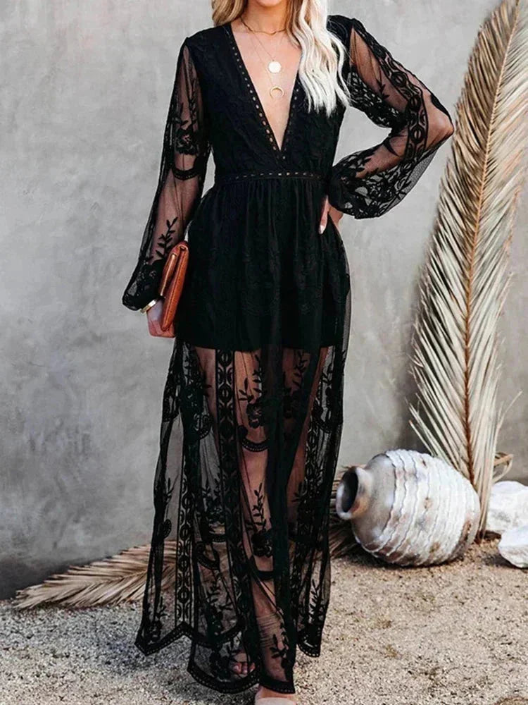 Black sheer lace maxi dress with long sleeves, elegant design.