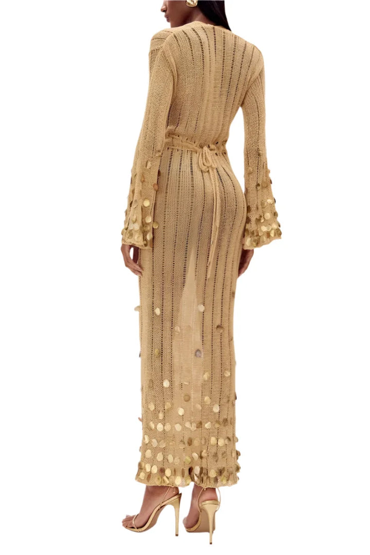 Sheer gold dress with sequin details perfect for special occasions.