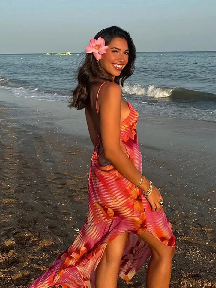 "Zylah maxi dress with beach-ready floral print, full-length design, perfect for summer outings."