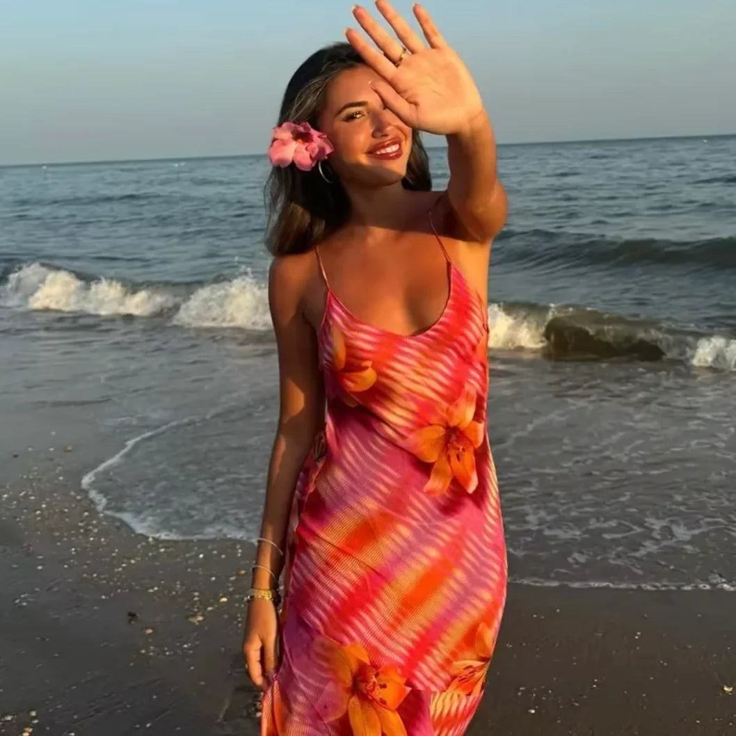 Floral print maxi dress with a beach-ready design, perfect for sunny days.