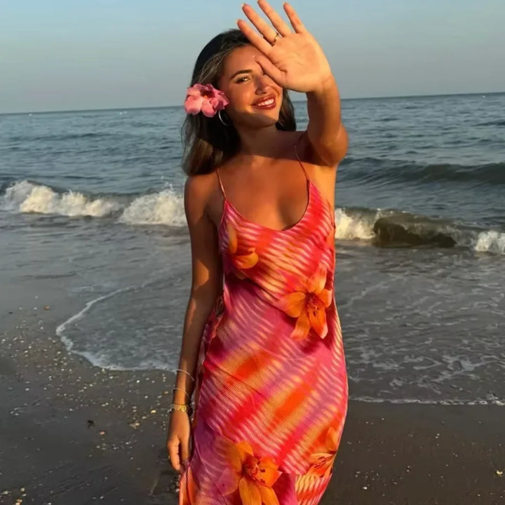 Floral print maxi dress with a beach-ready design, perfect for sunny days.