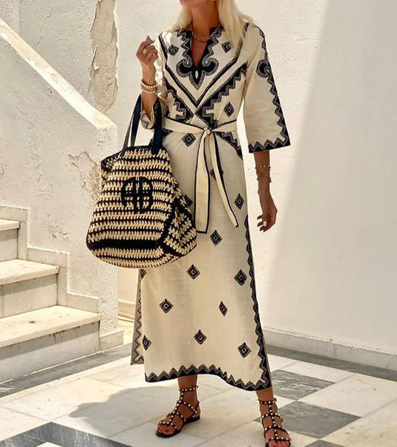 "Beige printed maxi kaftan with belt, featuring a bohemian design perfect for a relaxed and stylish look."