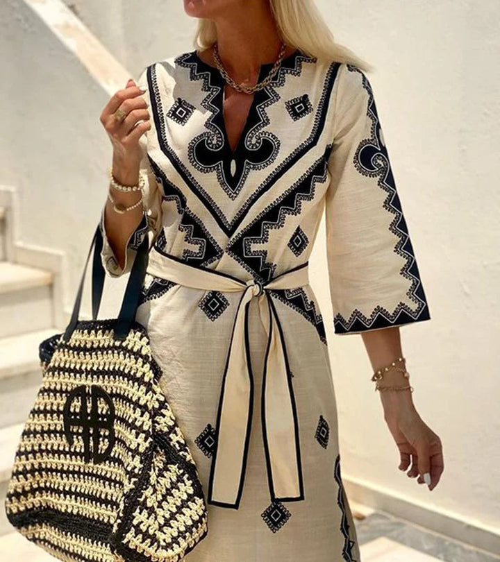 Beige printed maxi kaftan with belt featuring intricate designs and a comfortable fabric blend for a stylish look.